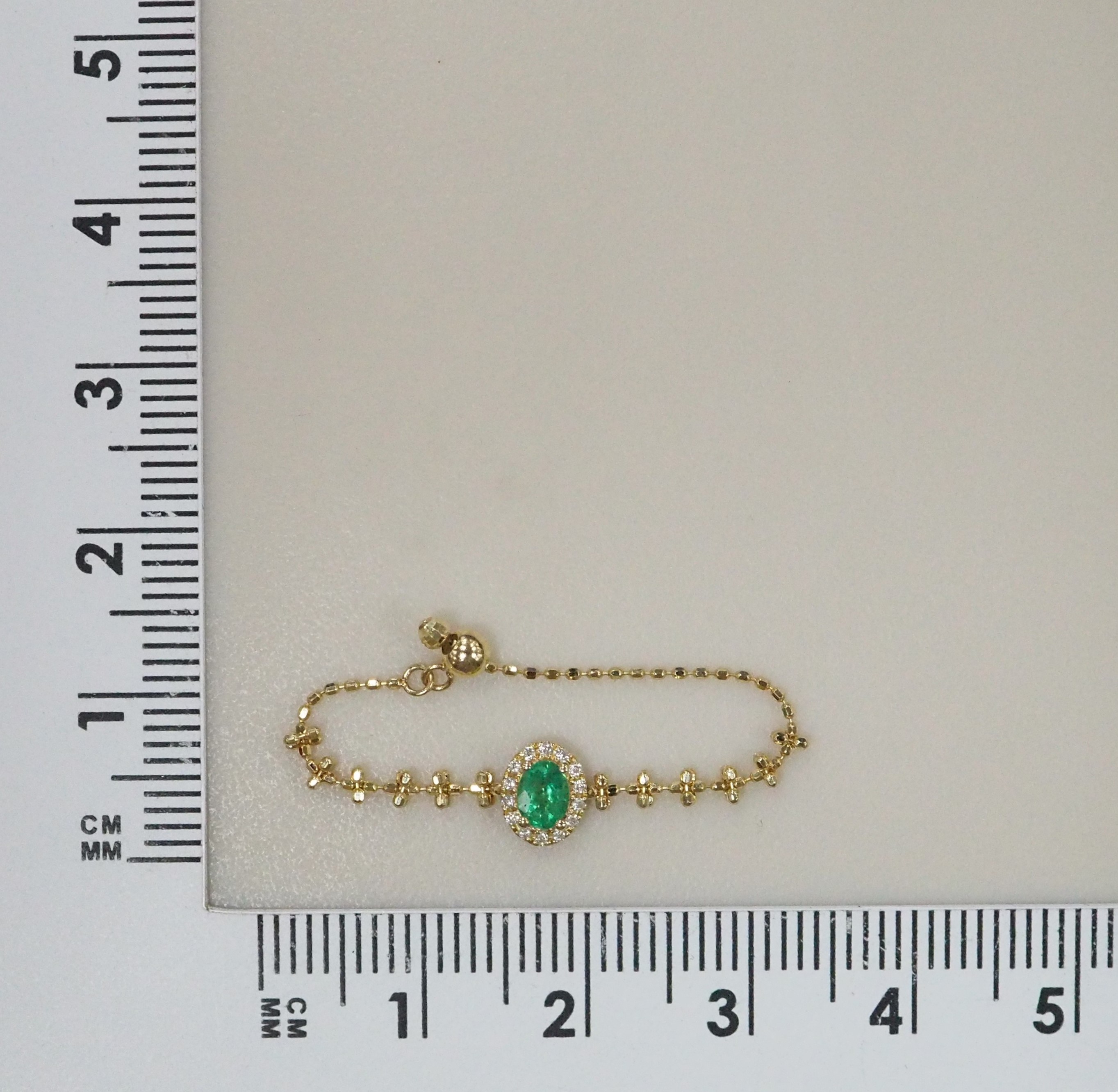 Кольцо из желтого золота с изумрудом